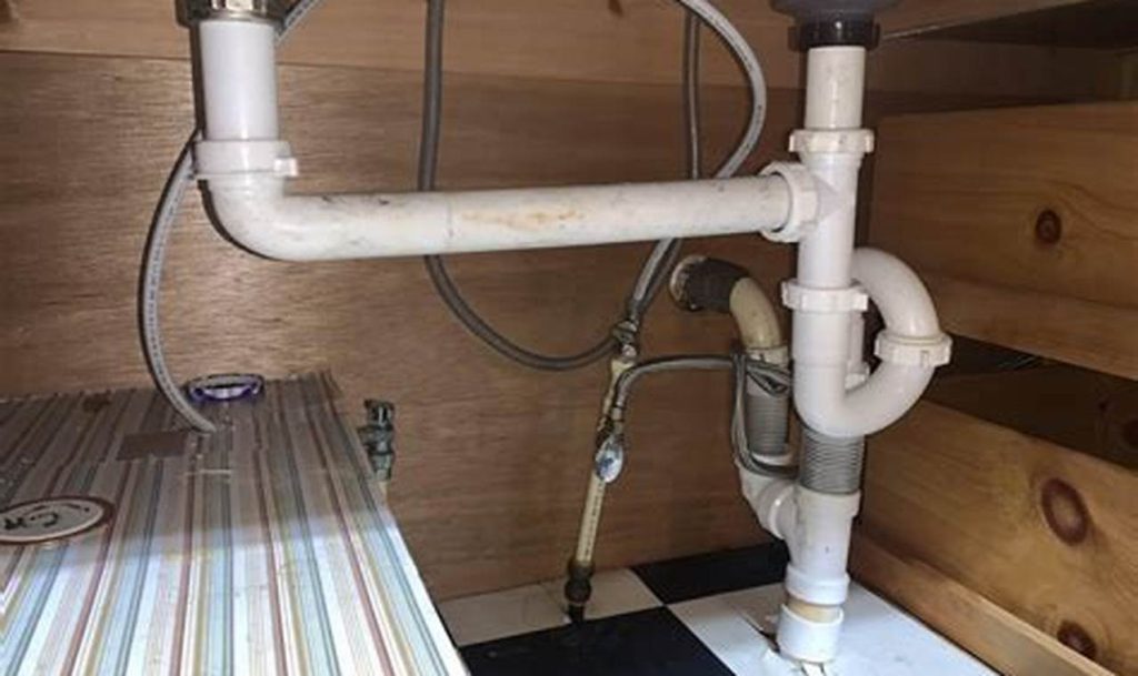 dripping under kitchen sink